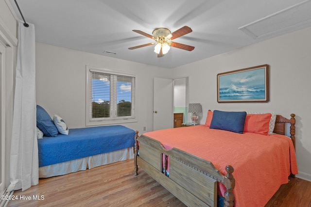 bedroom featuring ceiling fan and light wood-type flooring