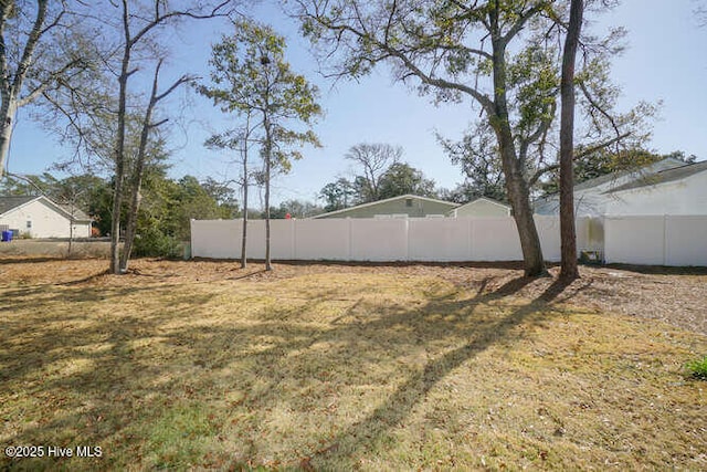 view of yard featuring fence