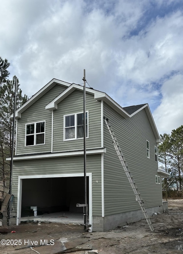 view of home's exterior with an attached garage