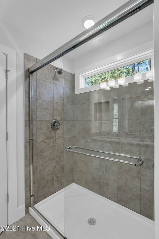 bathroom featuring walk in shower