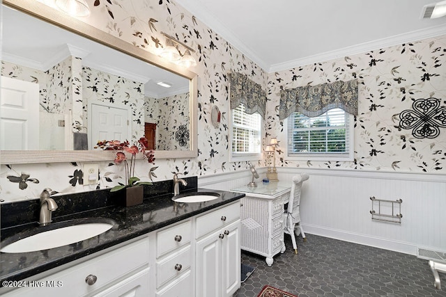 bathroom featuring vanity and ornamental molding