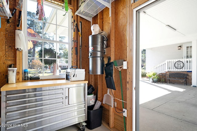 details featuring concrete flooring and wood walls