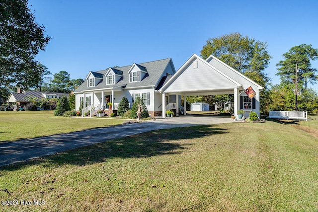 cape cod-style house with a carport and a front lawn