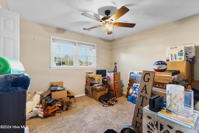 miscellaneous room featuring carpet flooring and ceiling fan