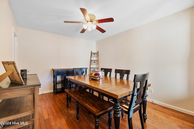 dining room featuring ceiling fan and light hardwood / wood-style floors