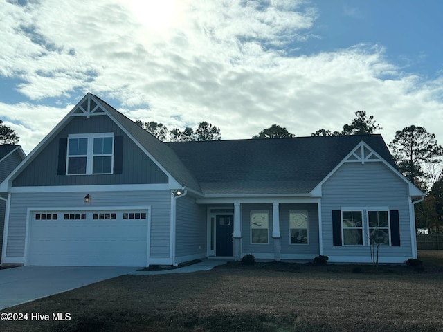 craftsman inspired home with a garage