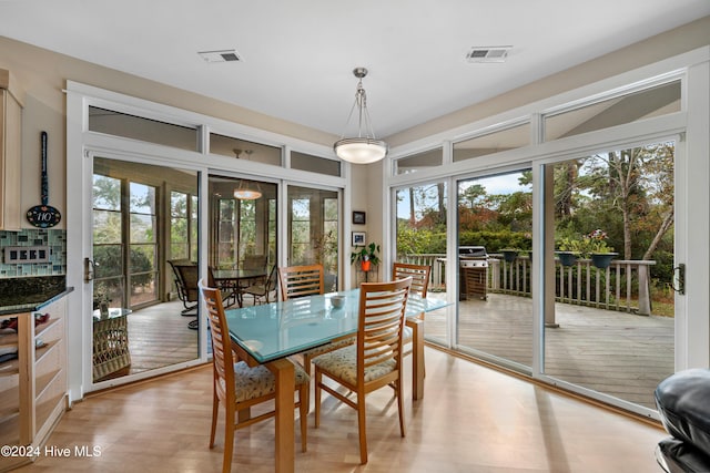 dining room featuring light hardwood / wood-style flooring