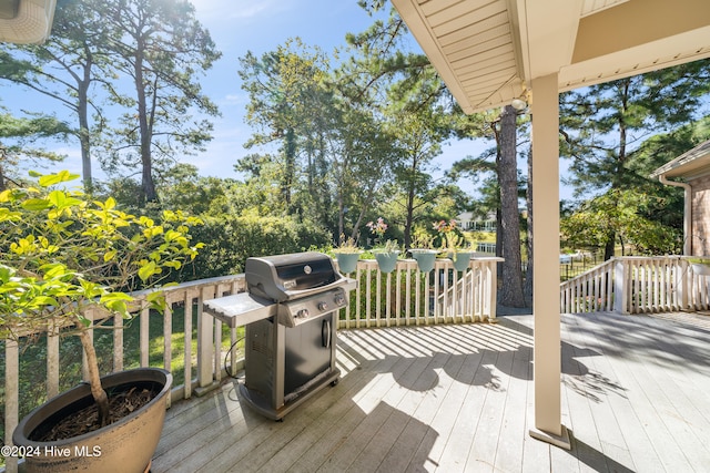 wooden deck with area for grilling