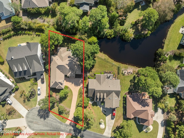 aerial view featuring a water view and a residential view