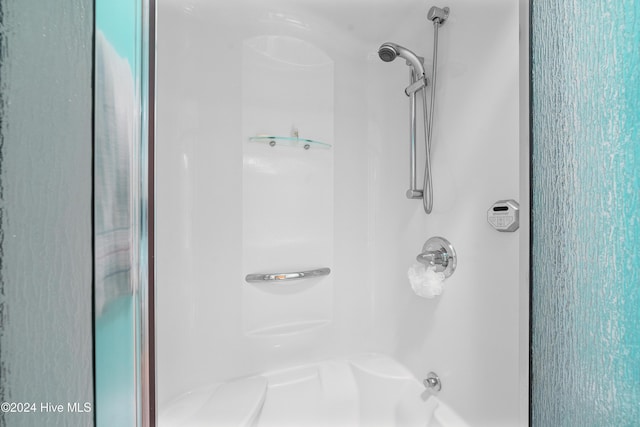 bathroom featuring walk in shower