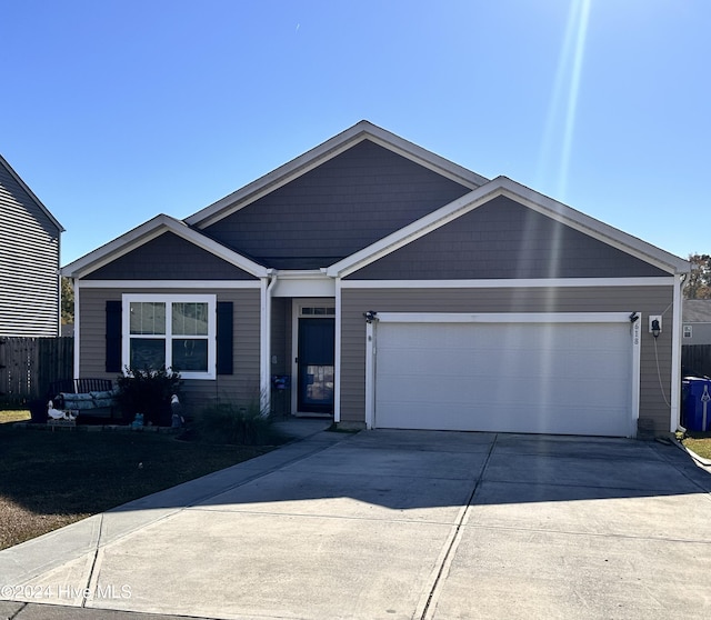 single story home featuring a garage