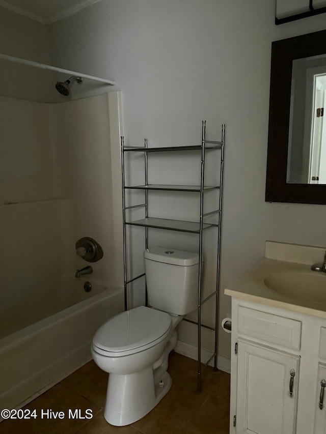 full bathroom with tile patterned floors, vanity,  shower combination, and toilet