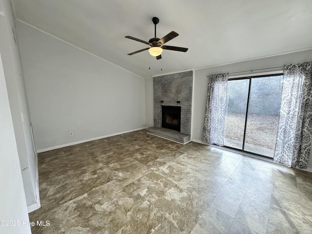 unfurnished living room with a fireplace, vaulted ceiling, and ceiling fan