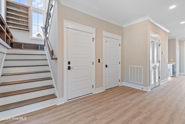 stairs featuring wood-type flooring