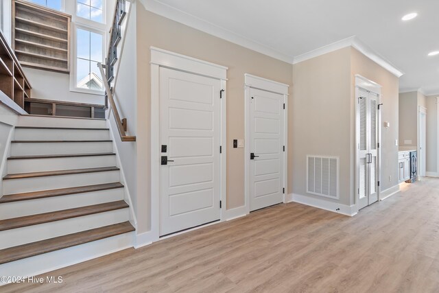 stairs featuring wood-type flooring