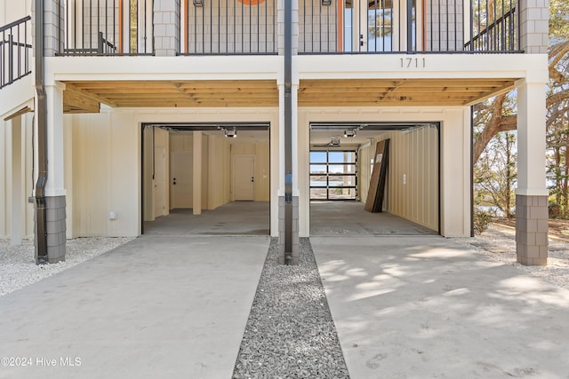 garage featuring a carport