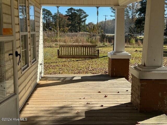 deck featuring covered porch