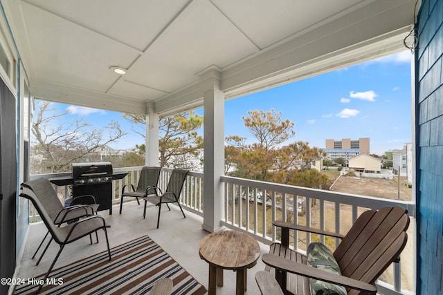 balcony featuring area for grilling