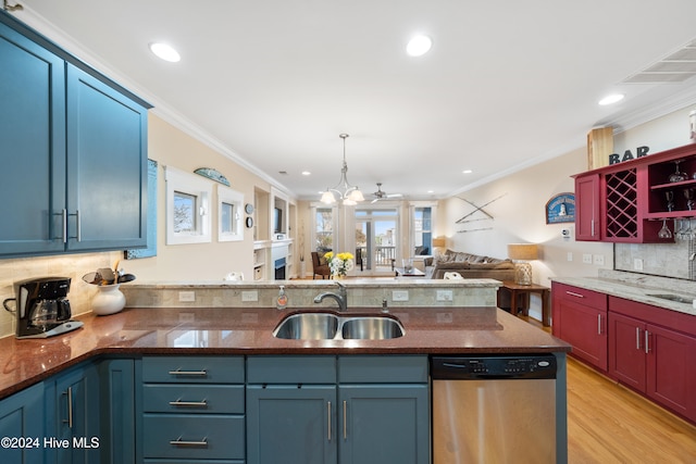 kitchen with sink, stainless steel dishwasher, a notable chandelier, light hardwood / wood-style floors, and ornamental molding