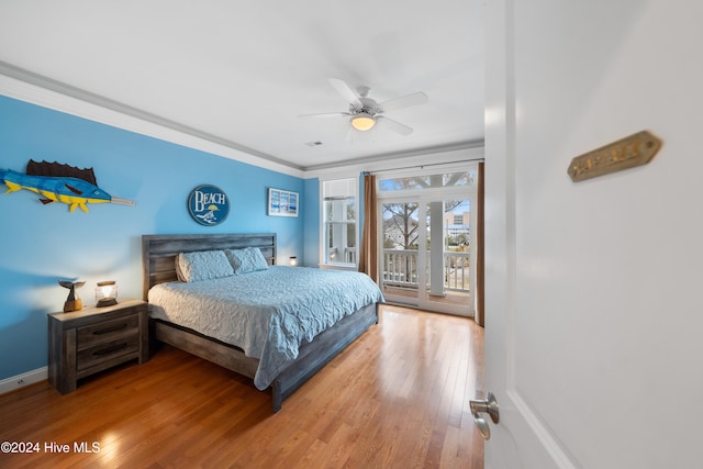 bedroom featuring ceiling fan, access to exterior, wood-type flooring, and crown molding