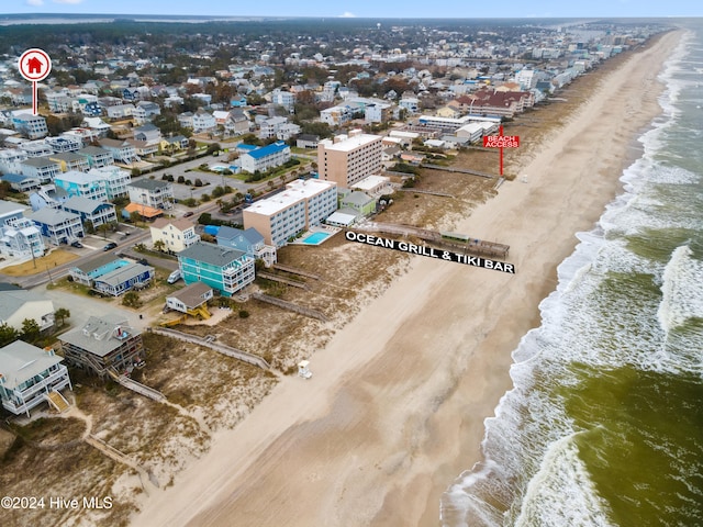 bird's eye view with a view of the beach and a water view