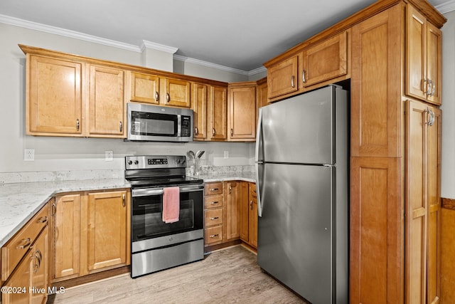 kitchen with light stone counters, ornamental molding, stainless steel appliances, and light wood-type flooring