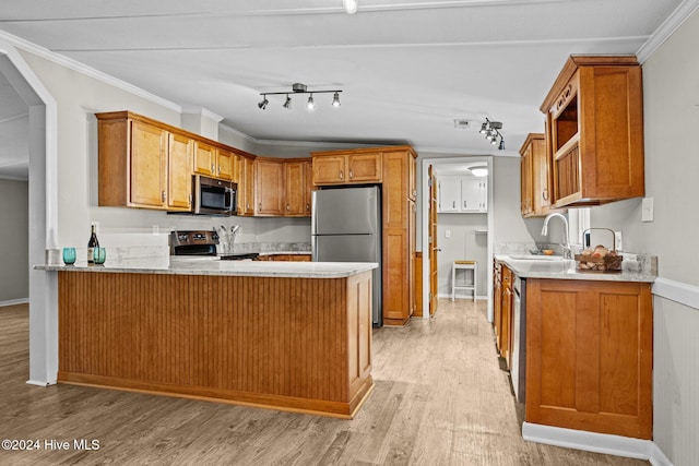 kitchen featuring sink, light wood-type flooring, crown molding, and appliances with stainless steel finishes