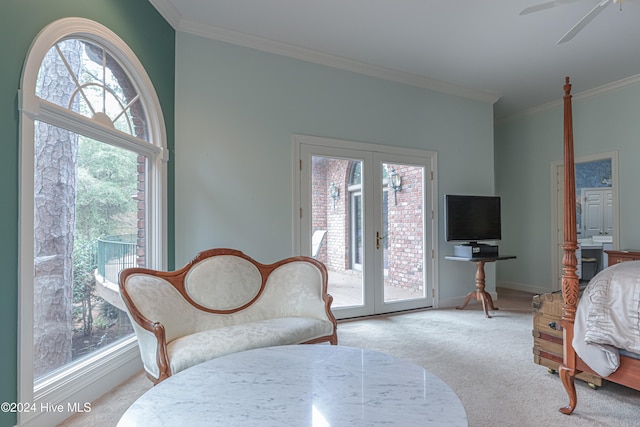 carpeted bedroom featuring ceiling fan, ornamental molding, access to outside, and french doors