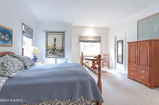 carpeted bedroom featuring ornamental molding