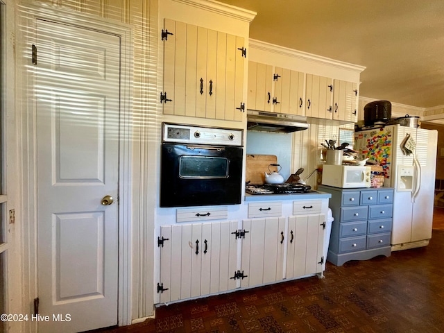 kitchen with white cabinets, white appliances, dark hardwood / wood-style floors, and exhaust hood