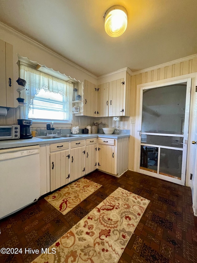 kitchen featuring backsplash, ornamental molding, sink, dishwasher, and white cabinetry