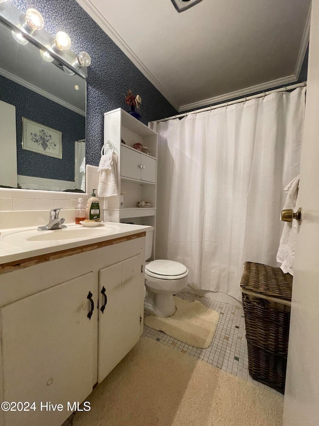 bathroom featuring tile patterned floors, crown molding, toilet, decorative backsplash, and vanity