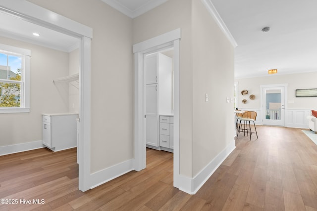 1514 Mackerel Ln, Carolina Beach, NC 28428 - hallway with light wood-style flooring and ornamental molding