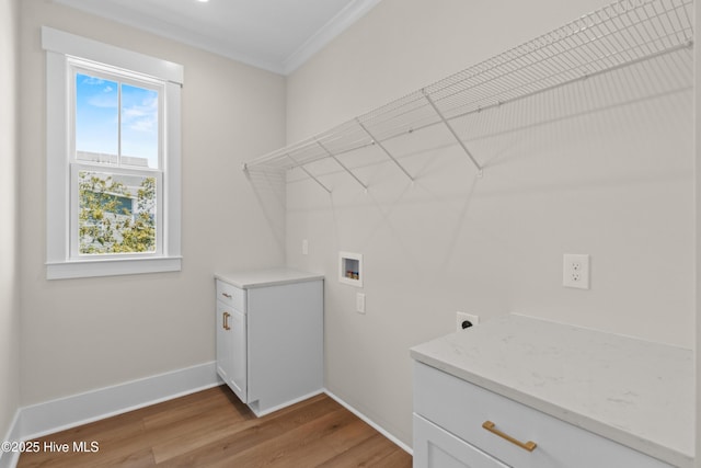 1514 Mackerel Ln, Carolina Beach, NC 28428 - laundry area featuring light wood-type flooring, baseboards, hookup for a washing machine, laundry area, and ornamental molding