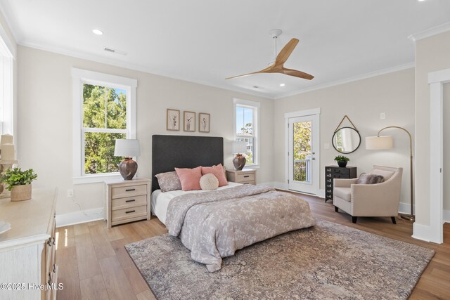 1514 Mackerel Ln, Carolina Beach, NC 28428 - bedroom featuring baseboards, ornamental molding, light wood finished floors, and visible vents