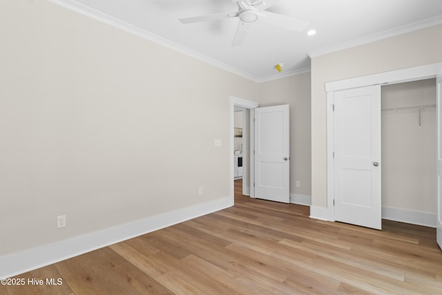 1514 Mackerel Ln, Carolina Beach, NC 28428 - unfurnished bedroom with light wood-type flooring, baseboards, a closet, ceiling fan, and ornamental molding