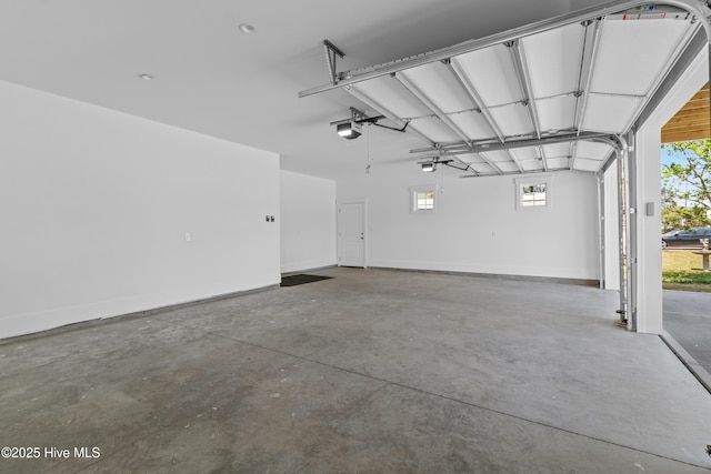 1514 Mackerel Ln, Carolina Beach, NC 28428 - garage with a garage door opener and baseboards