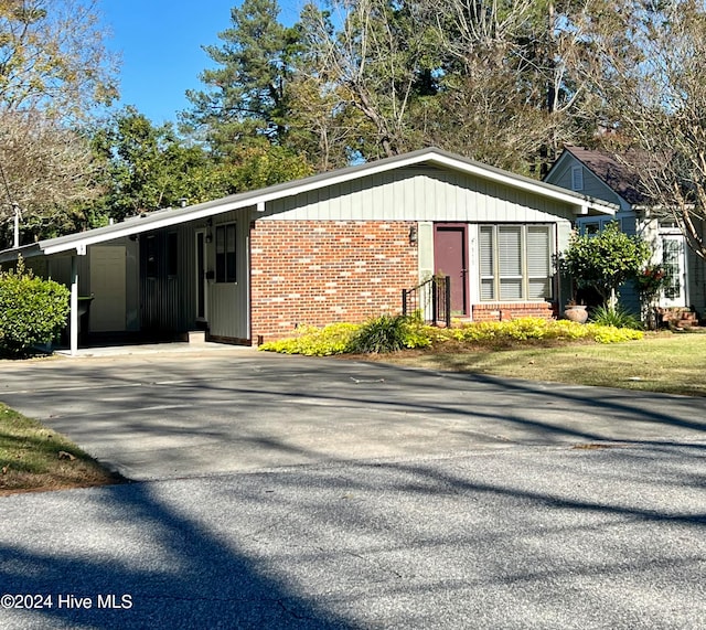 exterior space featuring a carport