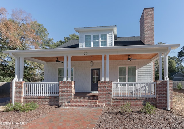 view of front facade with a porch and ceiling fan