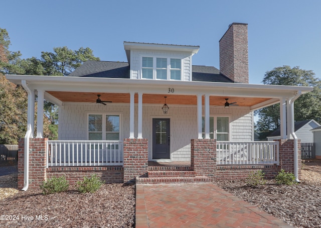 view of front of property with ceiling fan and a porch