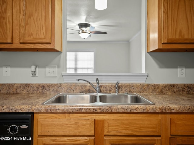 kitchen featuring crown molding, ceiling fan, sink, and black dishwasher