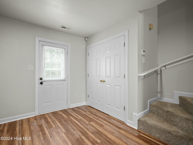 foyer featuring hardwood / wood-style floors