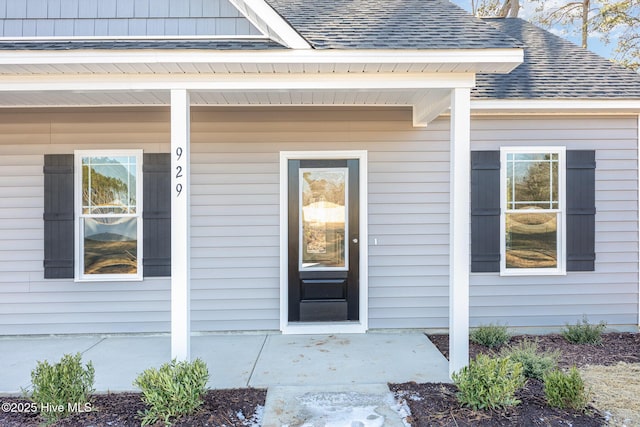 entrance to property with a porch