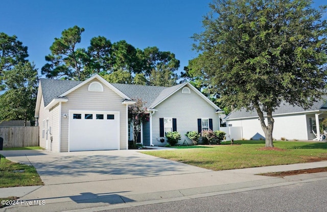 single story home featuring a front yard and a garage