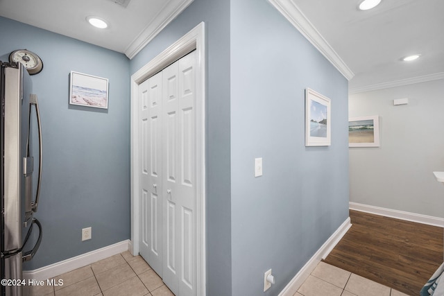 209 Hillside Dr N Unit 201, North Myrtle Beach, SC 29582 - hallway featuring light tile patterned floors, ornamental molding, and recessed lighting