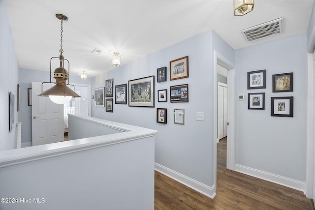 209 Hillside Dr N Unit 201, North Myrtle Beach, SC 29582 - hall featuring baseboards and dark wood-type flooring
