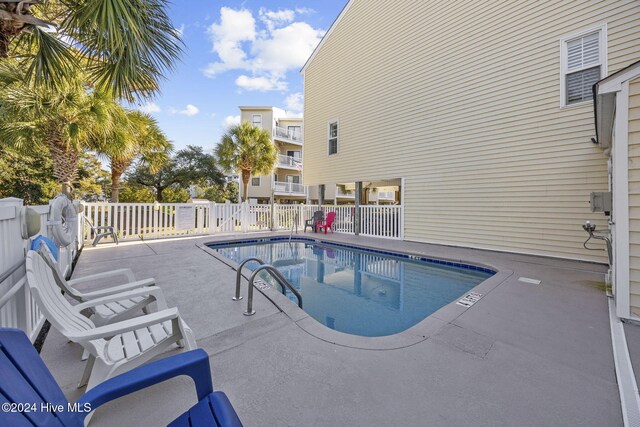 209 Hillside Dr N Unit 201, North Myrtle Beach, SC 29582 - community pool featuring a patio