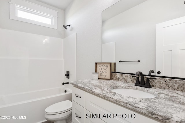 full bathroom featuring vanity, toilet, and shower / bath combination