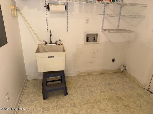 1738 NC-306 Hwy S, Grantsboro, NC 28529 - laundry area with washer hookup, hookup for an electric dryer, baseboards, and tile patterned floors