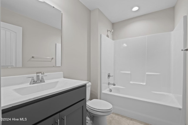 full bathroom with shower / tub combination, tile patterned floors, vanity, and toilet